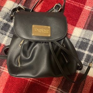 Bebe small backpack style purse
